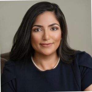 Charlotte County success story Priya Ahluwalia representing Rotary at NASDAQ launch.