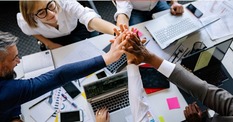 People Standing on Top of Building