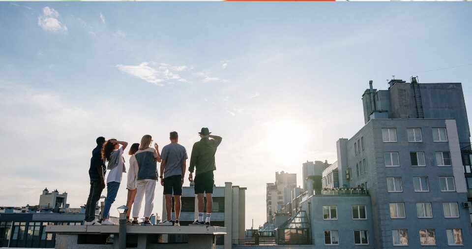 People Standing on Top of Building